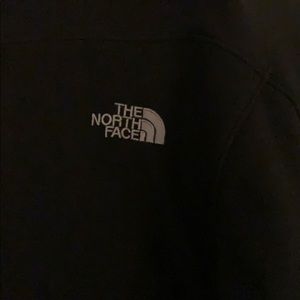 Black Men’s Small/Women’s Large North Face jacket